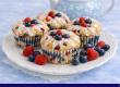 * INGREDIENTS * · 2 cups all-purpose flour · 3/4 cup granulated sugar · 1 tablespoon baking powder · 1/2 teaspoon salt · 1/2 cup (1 stick) unsalted butter, softened · 2 large eggs · 1 teaspoon vanilla extract . 3/4 cup whole milk · 1 1/2 cups mixed berries (blueberries, raspberries, and strawberries), washed and gently patted dry · Zest of 1 lemon · 1 tablespoon lemon juice FOR THE SIMPLE GLAZE (OPTIONAL) · 1 cup powdered sugar · 1-2 tablespoons milk · 1/2 teaspoon vanilla extract